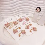 ست کش و پنس مو میکی موز صورتی و نود