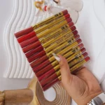 پک 12 تایی رژ مدادی برند YUBE پوکه طلایی کد B