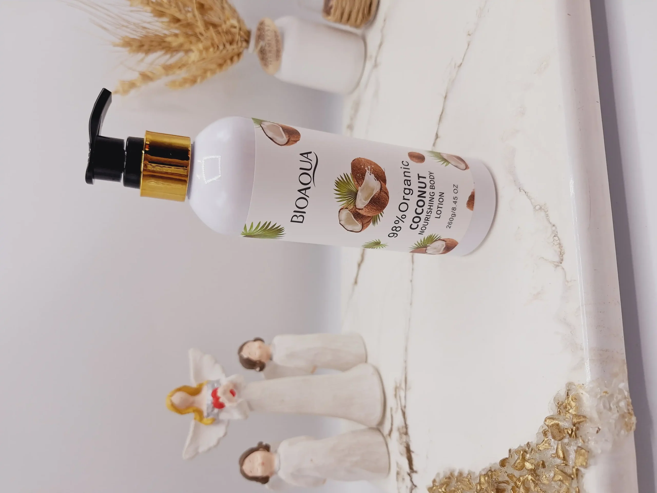 20250731061523871-thumbnail لوسیون بدن پمپی نارگیل بیواکوا رفع زبری پوست بدن خوشبو کننده پوست کد 2827 - Image 1