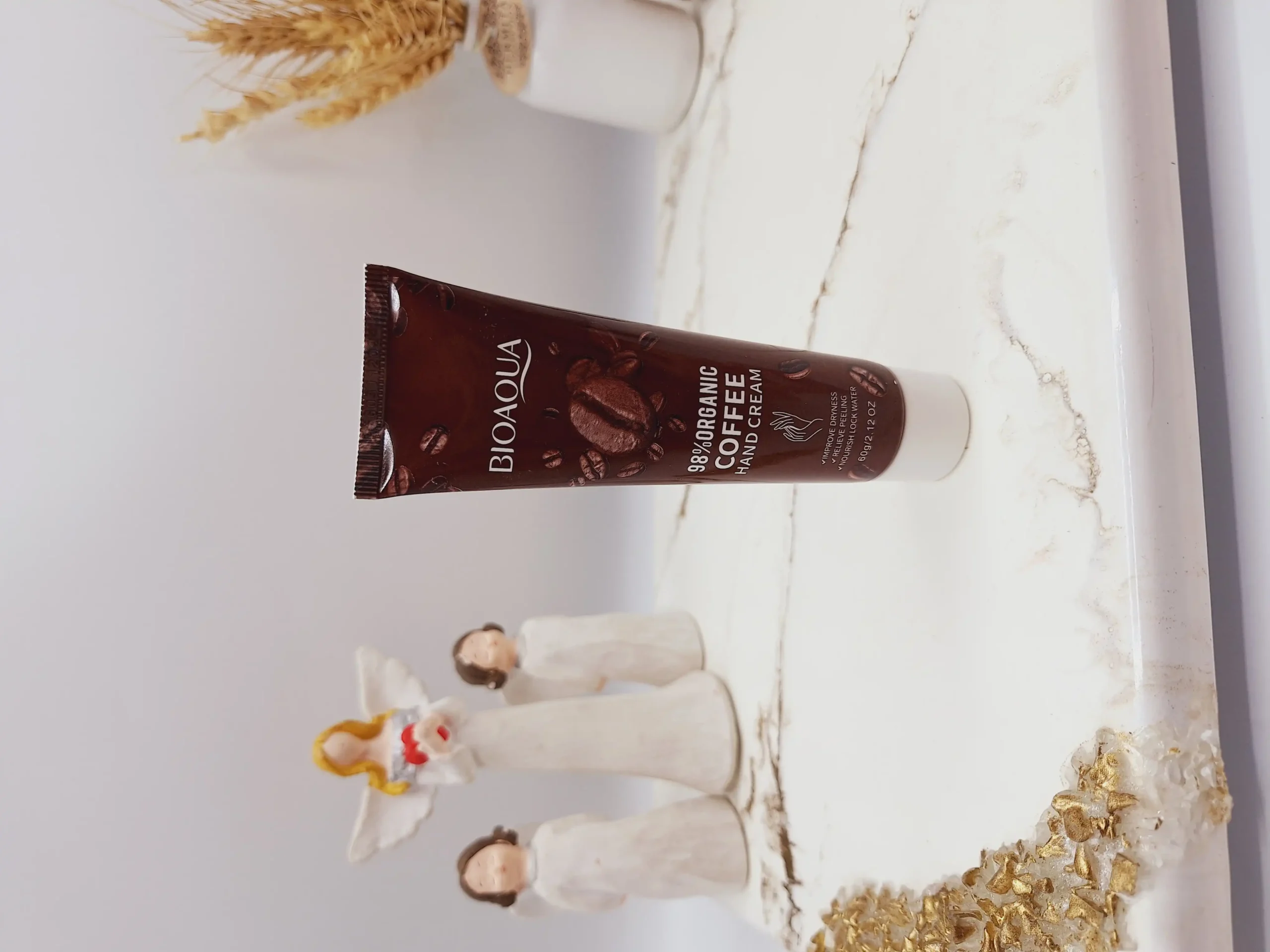 20250731061532087-thumbnail کرم دست قهوه ارگانیک حجم 60 گرم برند بیوآکوا کد 2124 - Image 1