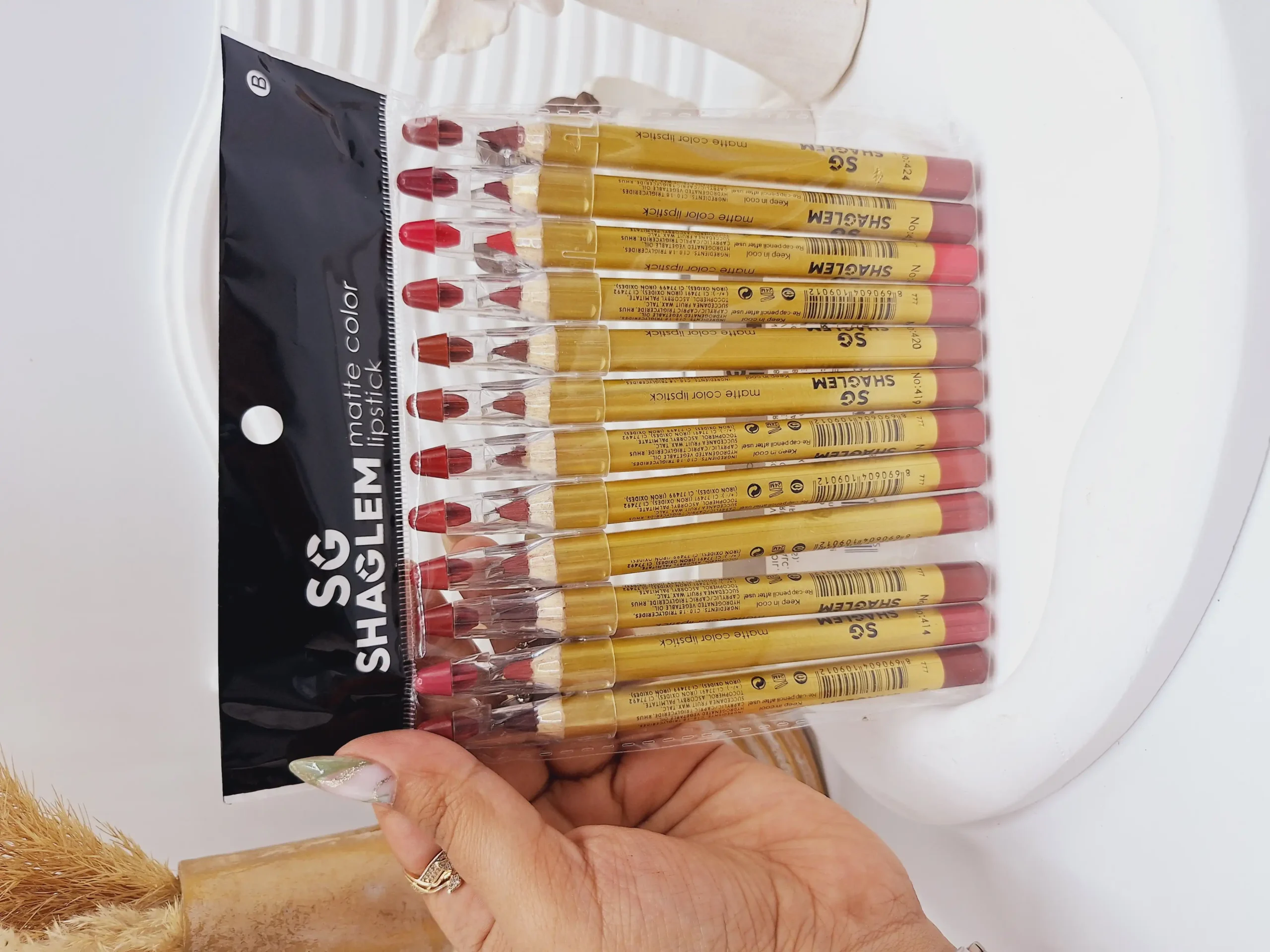 20250731062432128-thumbnail پک 12 تایی رژ مدادی برند شیگلم کد 9012 - Image 1