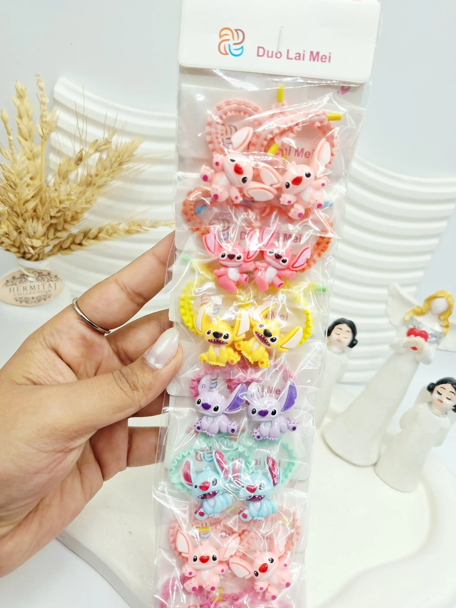 20251117121250589-thumbnail ست 10 تایی کش مو 2 تایی طرح استیچ - Image 1