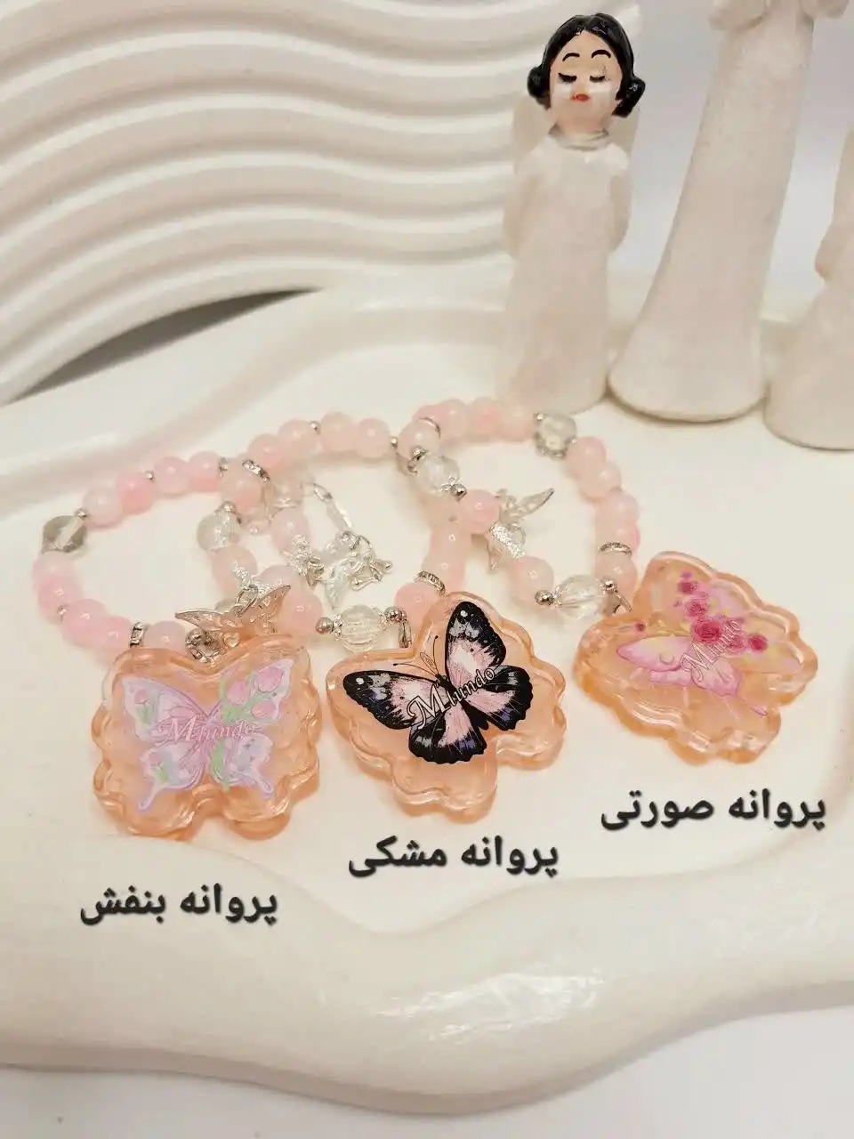 20251115134803385-thumbnail عطر صابونی مدل پروانه همراه دستبند مرواریدی کد 100220 - Image 1