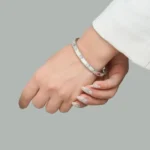 دستبند بنگال نقره ای نگین دار طرح گل استیل