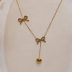 گردنبند طرح پاپیون و آویز دار قلب طلایی