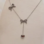 گردنبند طرح پاپیون و آویز دار قلب نقره ای