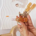 لیپ گلاس ذرات طلا برند MAGIC کد LC235