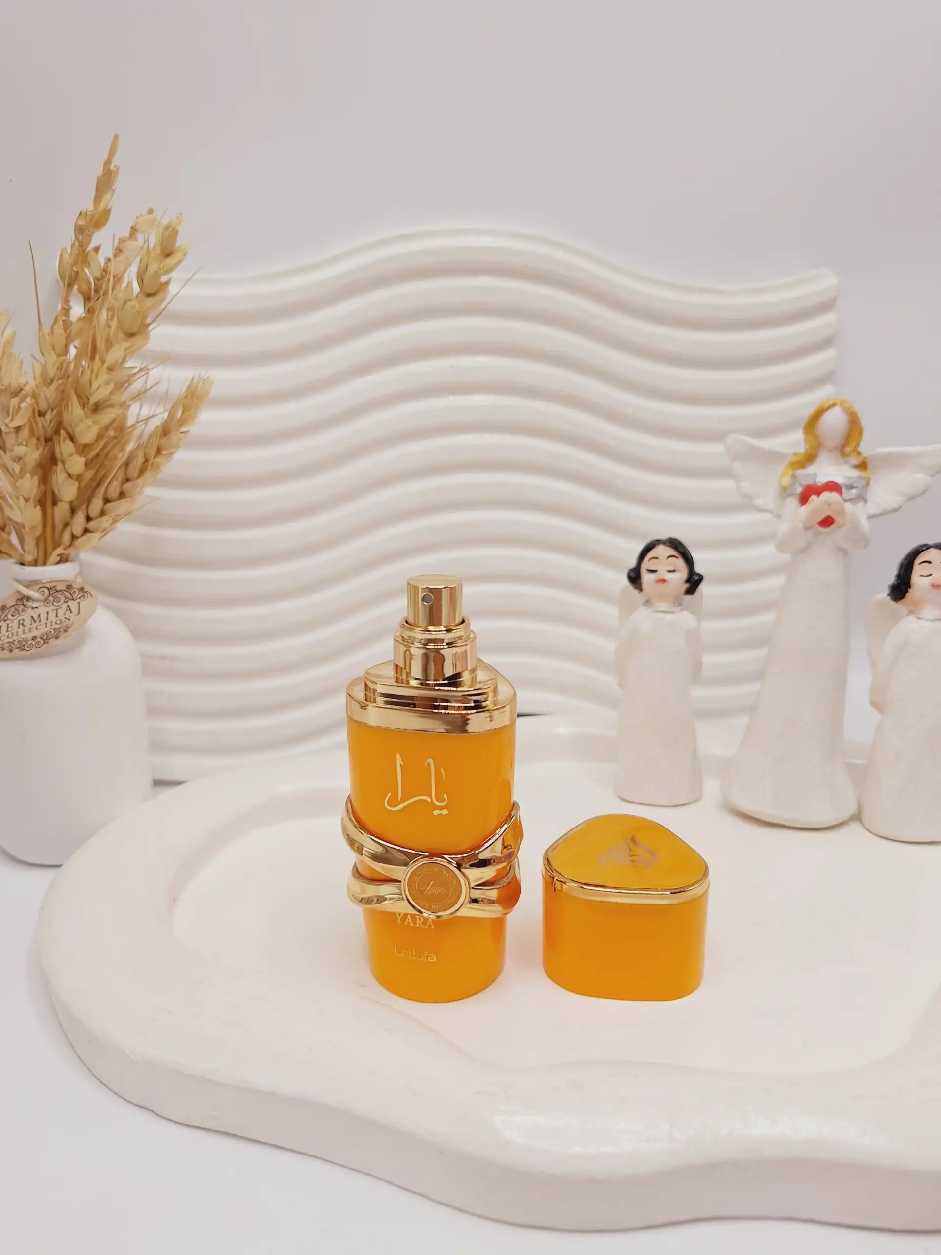 20251009060507228-thumbnail ادکلن زنانه (نارنجی) یارا کد 1582 - Image 1