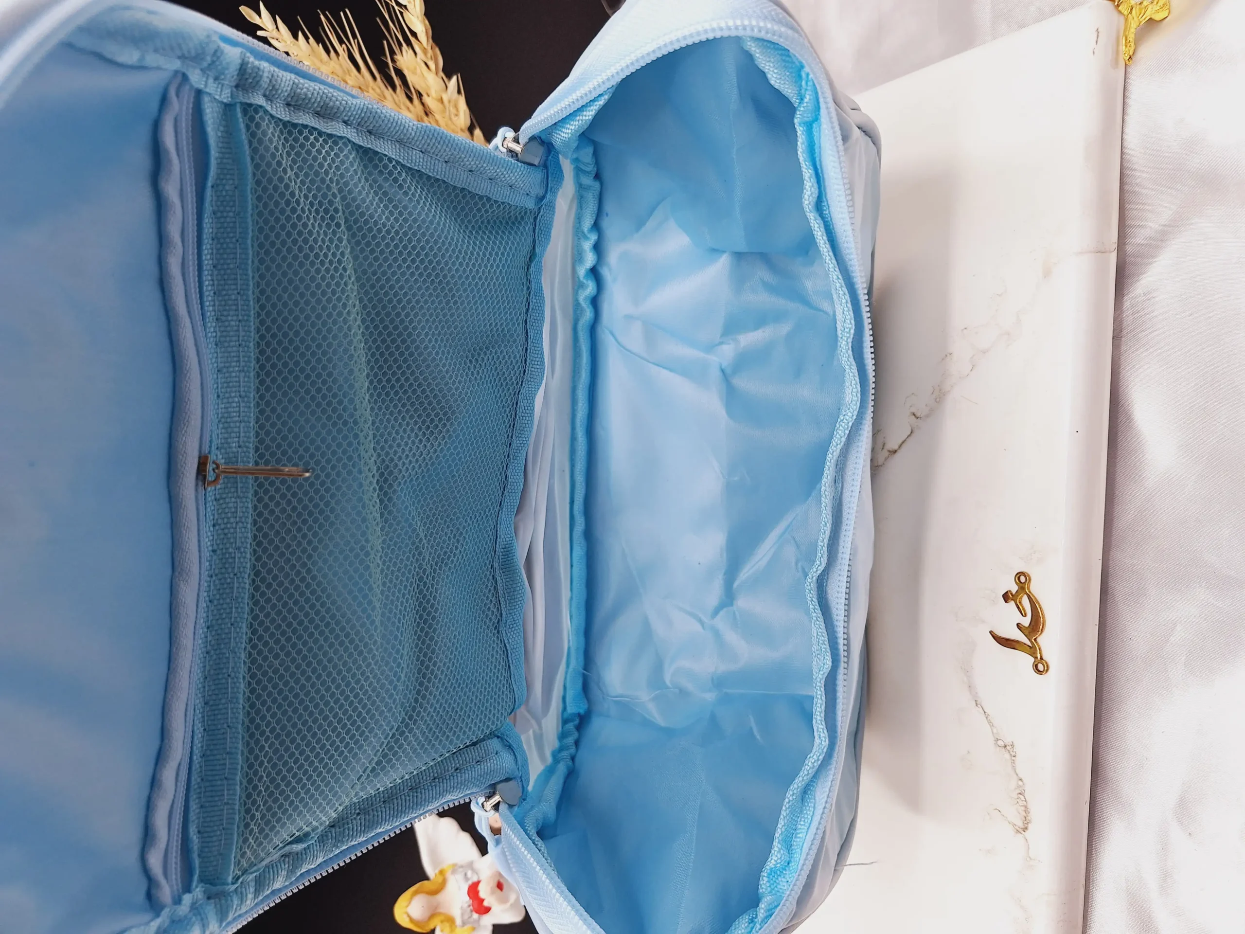 20250731045059234-thumbnail کیف آرایشی واشبگ بیضی آبی سایز بزرگ WASHBAG - Image 1