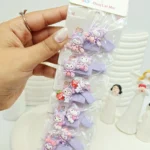 ست 10 تایی گیره مو طرح دلقک کرومی و توت فرنگی