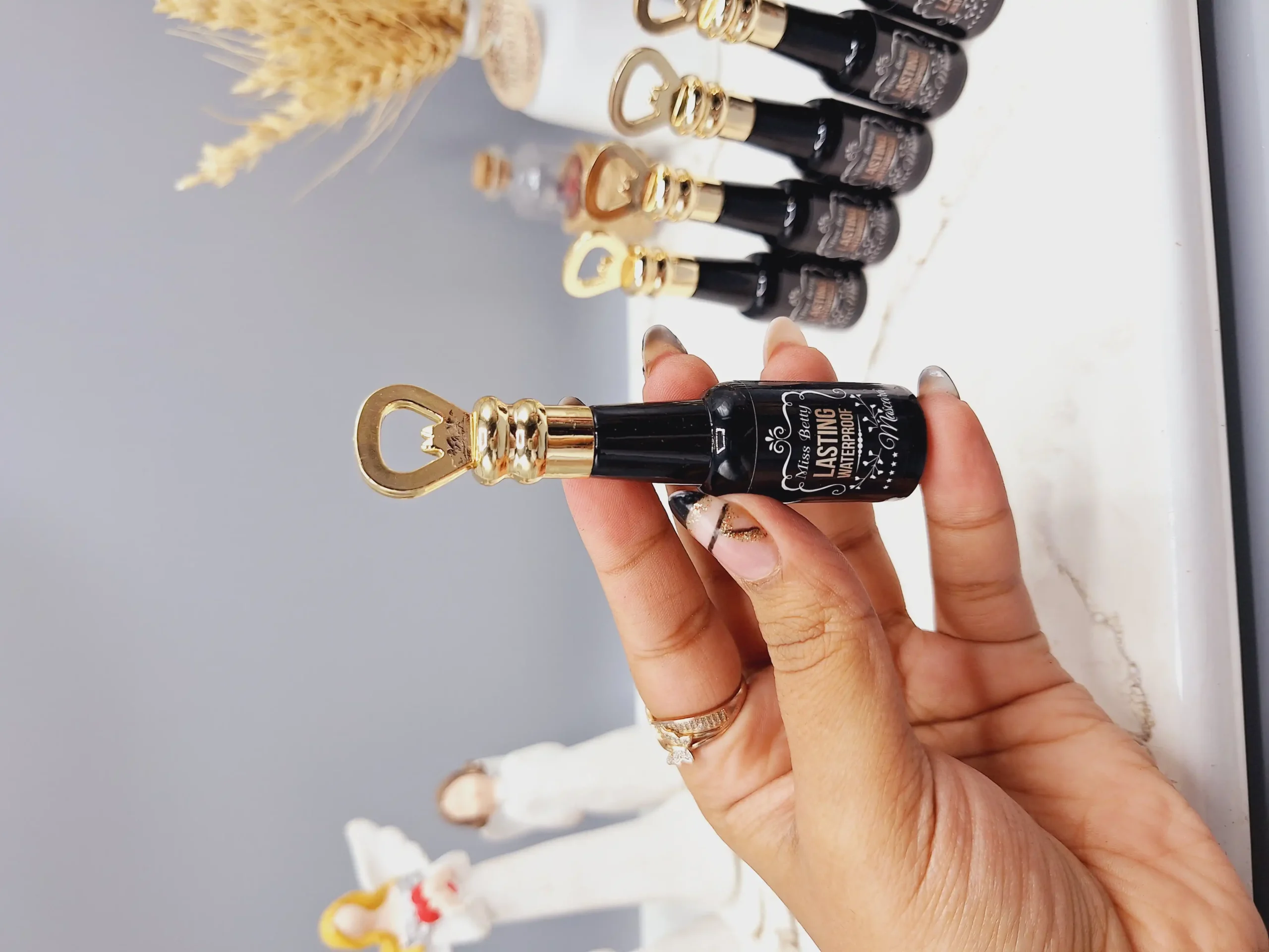 20250731054747162-thumbnail ریمل پوکه مشکی شامپاینی Miss Betty کد M1167 - Image 1